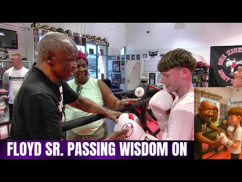 Floyd Mayweather passing on his wisdom to a young man just learning boxing
