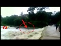 Watch video: 2 bikers washed away in Uttarakhand floods