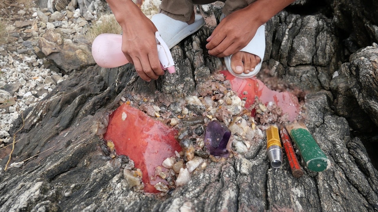Unveiling the Mysterious World: A Beautiful Girl Discovers Precious Crystals in a Pile of Rocks
