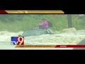Dramatic high-water rescue : SAFD saves man stranded on SUV