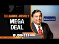 RELIANCE, DISNEY SIGN NON-BINDING AGREEMENT; RELIANCE INDUSTRIES TO HOLD 51%