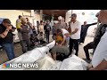 Grieving relatives prepare Gaza airstrike victims for burial