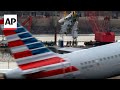 Washington plane crash victims family sues FAA, Army and American Airlines