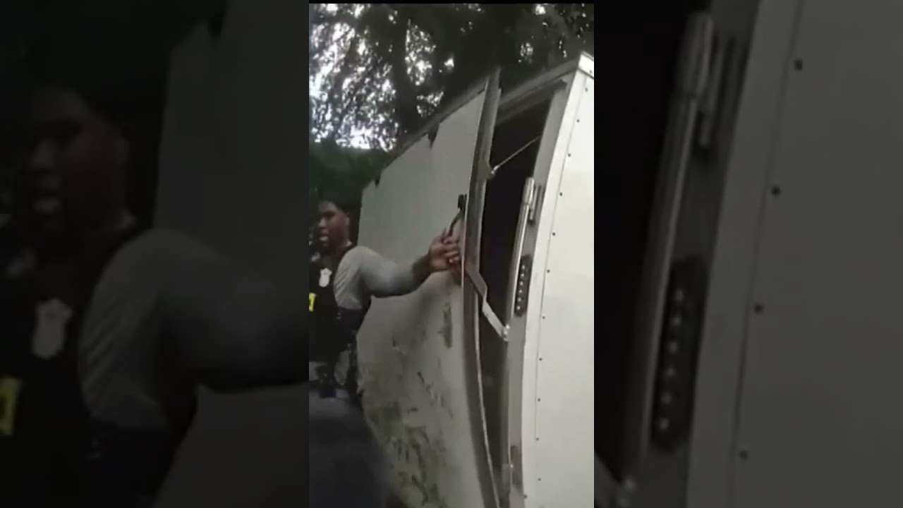 Bodycam shows officers rescuing girls from locked, 97-degree trailer