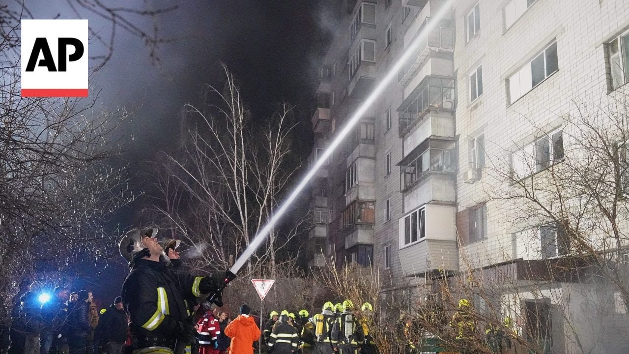 Firefighters tackle blaze at residential building after drone attack on Kyiv region