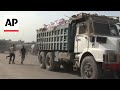 Trucks enter Gaza at the Rafah Crossing bringing much-needed aid supplies