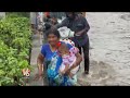 Woman Carry Daughter In Flood Water At Ameerpet | V6 News  - 03:35 min - News - Video