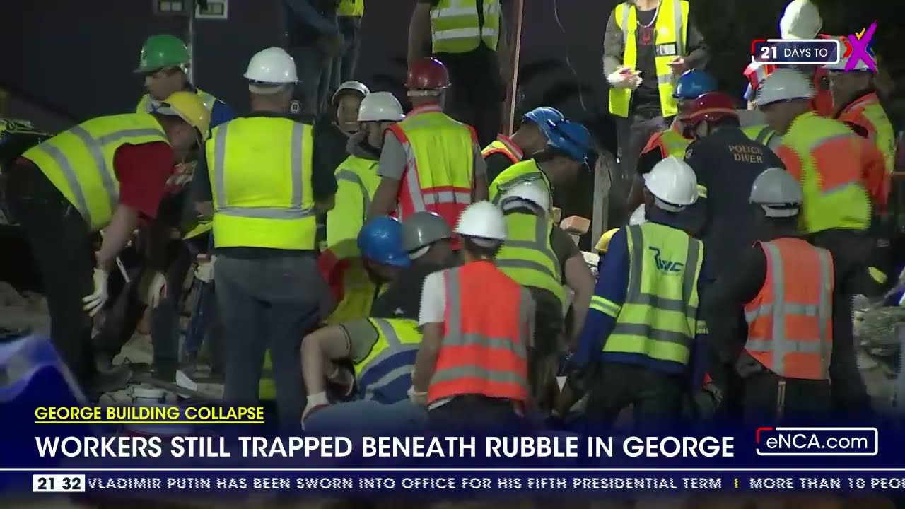 George Building Collapse | Rescue teams bring another worker to the surface