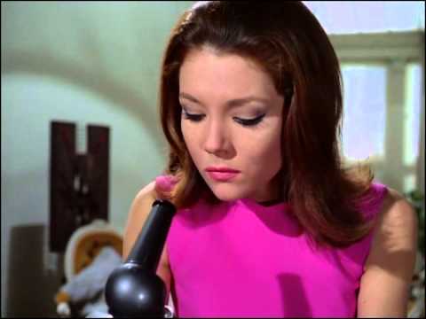 Youtube video - Mrs Peel is examining some specimen slides and is astonished to find that one of them has been altered so that Steed’s signature summons - ‘Mrs. PEEL - WE’RE NEEDED’ is visible through the microscope