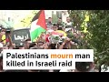 Palestinians mourn man killed in Israeli raid