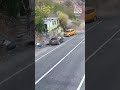 Cab driver narrowly avoids falling boulder