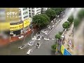 Caught on camera: Vehicles swept away by flood in South China