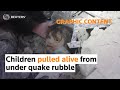 WARNING: GRAPHIC CONTENT - Children pulled alive from under quake rubble