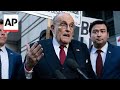 Rudy Giuliani blasts Biden on his way out of court in Georgia defamation case