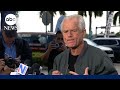 Peter Navarro remains defiant as he reports for prison sentence