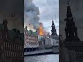 Spire collapses in #fire at #Copenhagen stock exchange  - 00:21 min - News - Video