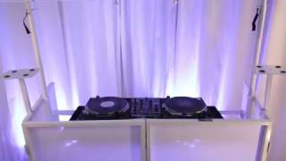 NOVOPRO SDX V2 Mobile Folding DJ Booth with Table, Scrim and Lighting Bar - Black in action - learn more