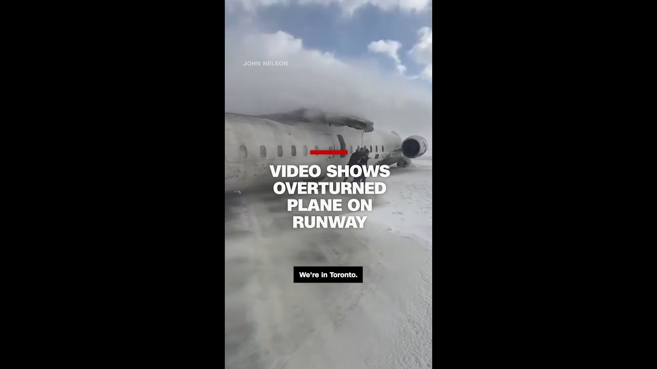 Video shows overturned plane on runway