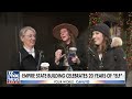 Empire State Building spreads Christmas cheer to celebrate Elfs 20th anniversary  - 04:13 min - News - Video