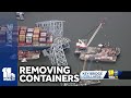 Crews work to remove containers from Dali ship, reopen channel