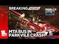 Car flipped on side in crash involving MTA bus