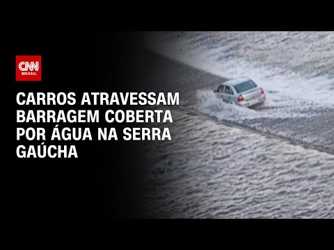 ​Carros atravessam barragem coberta por água no Rio Grande do Sul | CNN PRIME TIME