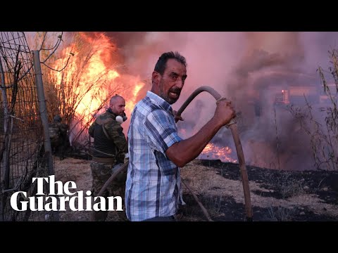 Wildfire 'moves like lightning' around Athens forcing residents to evacuate