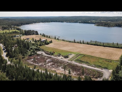 Bygg hus med SmålandsVillan med utsikt över Tavelsjön