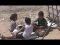 Volunteers distribute food in camp for displaced Palestinians in Gaza  - 01:01 min - News - Video