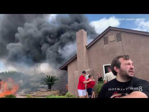 Pilot, truck driver killed as plane crashes into houses, elderly couple rescued Pilot, truck driver killed as plane crashes into houses, elderly couple rescued