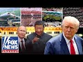 CONSPIRING AGAINST US: Trump fires back as China showcases weapons that could reach US mainland