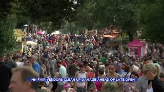 Minnesota fair vendors clean up damage after storm