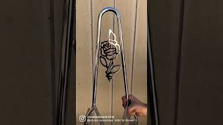 Chrome rose sissy bar by Edward Richie