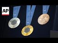 The Paris Olympics medals are monumental: Theyre made with metal chunks from the Eiffel Tower