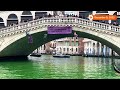 Climate change protesters turn Venice canal green
