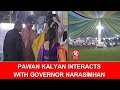 Pawan Kalyan interacts with Governor Narsimhan in feast