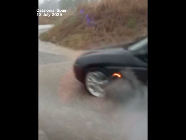 Flooded road in parts of Spain's Catalonia amid heavy storm alerts