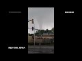 WATCH: Funnel cloud caught on video in Iowa as tornado warnings issued  - 00:36 min - News - Video