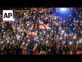 Georgian protesters against Russia-style media law mark Orthodox Easter with candlelight vigil