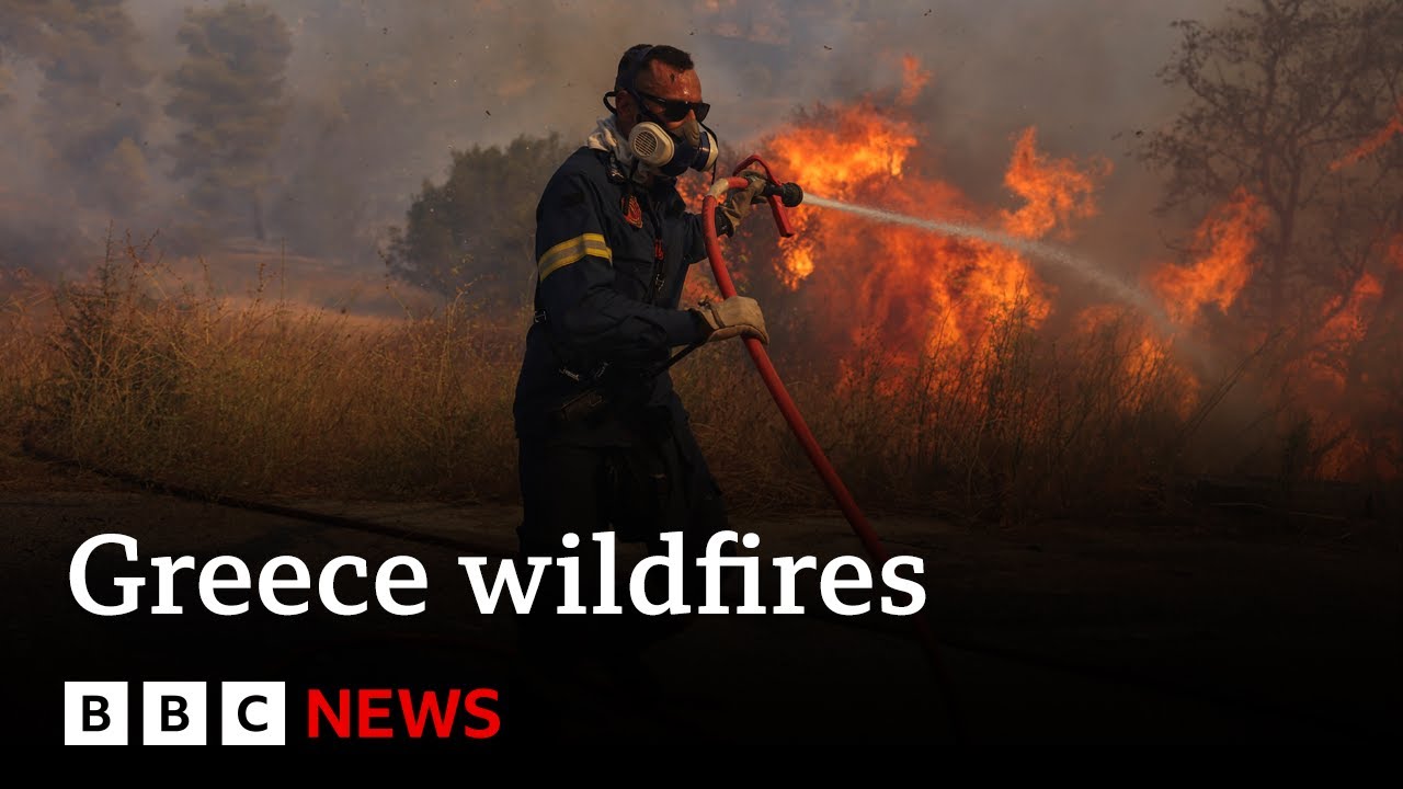 Greece wildfires reach Athens as thousands are evacuated | BBC News