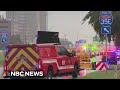 Witness says she took cover after hearing gunshots at Dallas ICE facility 