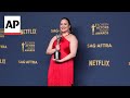 Lily Gladstone says the weight of her SAG Award win is heavy - literally and figuratively