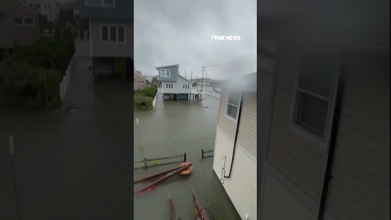 Floodwater RUSHES through coastal New Jersey neighborhood #flood #shorts #newjersey #usa