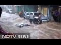 Caught on camera: Bike swept away in flooded street in Mathura