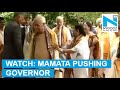 Mamata Banerjee pushes Governor  away from PM Modi