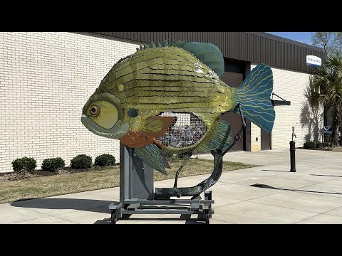 screenshot of youtube video titled Fish Sculpture Raising Awareness About Litter | Making It Grow