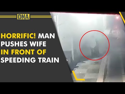 Man pushes wife in front of moving train, disturbing visuals Man pushes wife in front of moving train, disturbing visuals