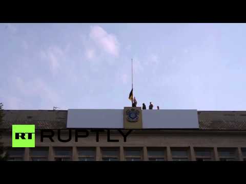 Ukraine: Ukrainian flag flies high over former Kramatorsk DPR hq