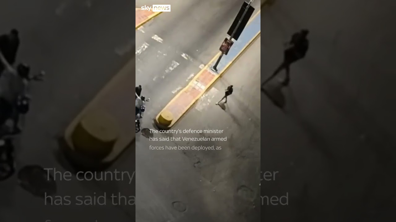 Armed men and tank seen on streets of Venezuela