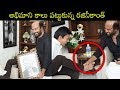 Rajinikanth Touches His Fan Feet Representing Handshake